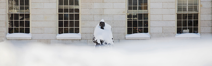 John Harvard statue covered in snow